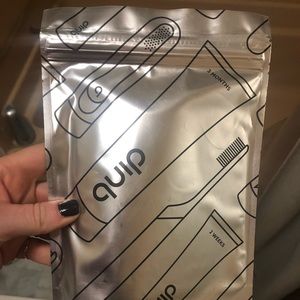 Quip brush head and toothpaste